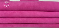 Pink suede Italian goatskin leather skins displayed, showcasing soft texture and high-quality craftsmanship by Italianskins.