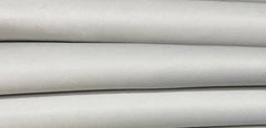 Undyed Italian lambskin leather skins with chrome tanning, showcasing natural, soft, and smooth leather surface from italianskins.