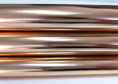 Shiny metallic rose gold Italian lambskin leather skin with smooth texture and natural sheen, perfect for luxury leather crafting.