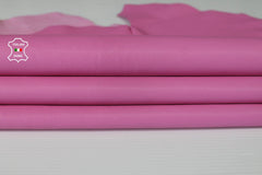 Washed candy pink Italian goatskin leather skin by Italianskins, showcasing smooth, genuine vegetable-tanned leather with natural texture.
