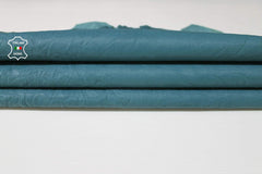 Washed teal blue wrinkled Italian lambskin leather skin from Italianskins, genuine vegetable-tanned and textured for a luxurious look.